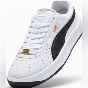 Puma Men's White and Black Sneakers with Gold Accents